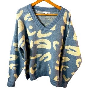 HYFVE blue and white leopard print v neck sweater in oversized large.
